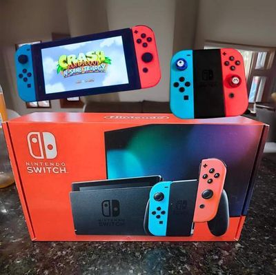 Nintendo Nintendo Switch Switch 32GB Standard cor  vermelho-néon, azul-néon e preto